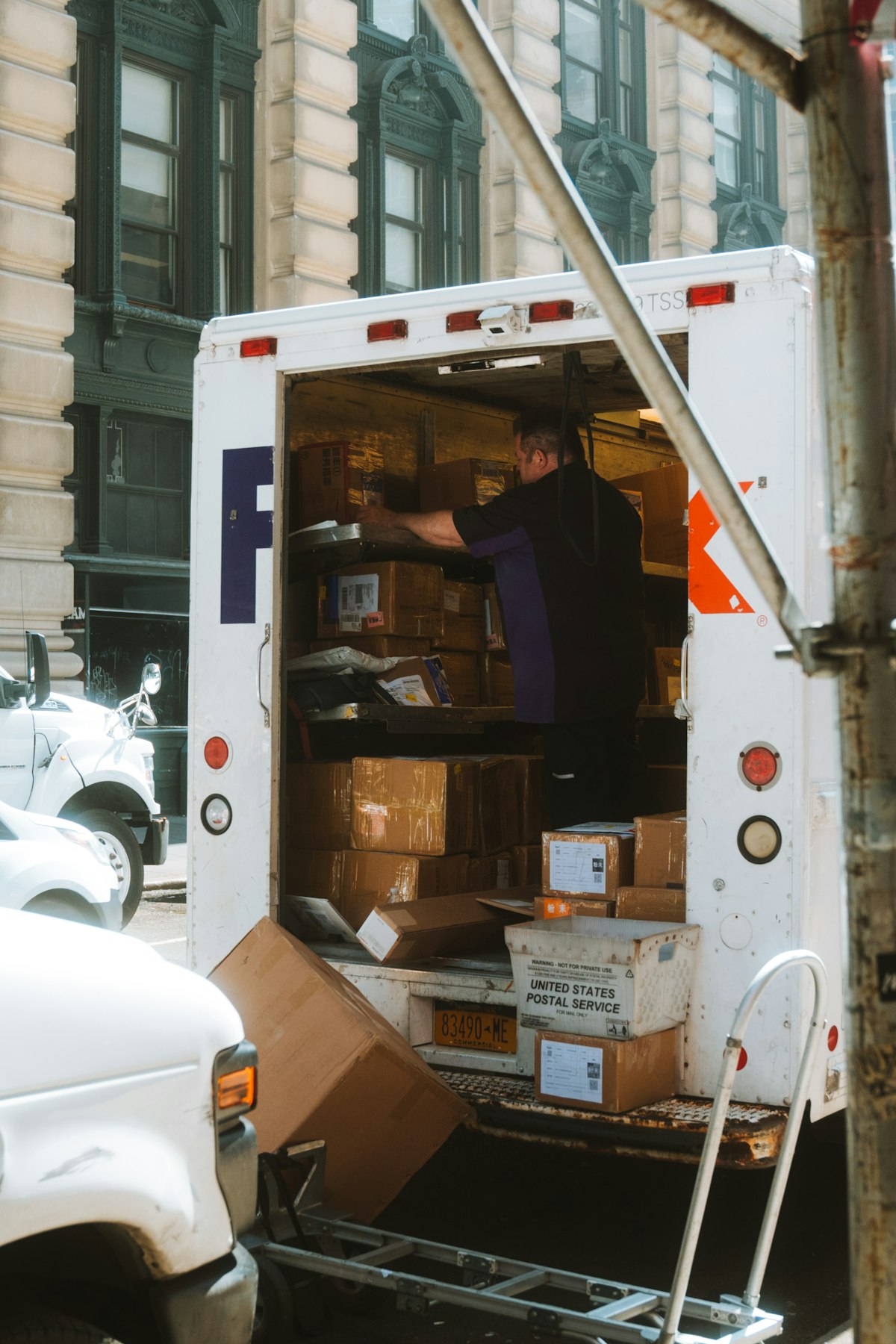 Crew loading boxes into a moving truck